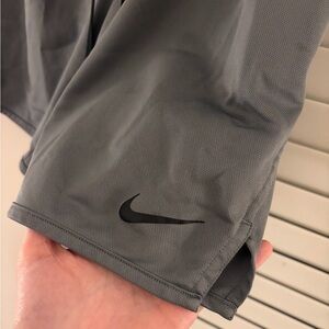 Nike Gray Athletic Shorts with Black Swoosh